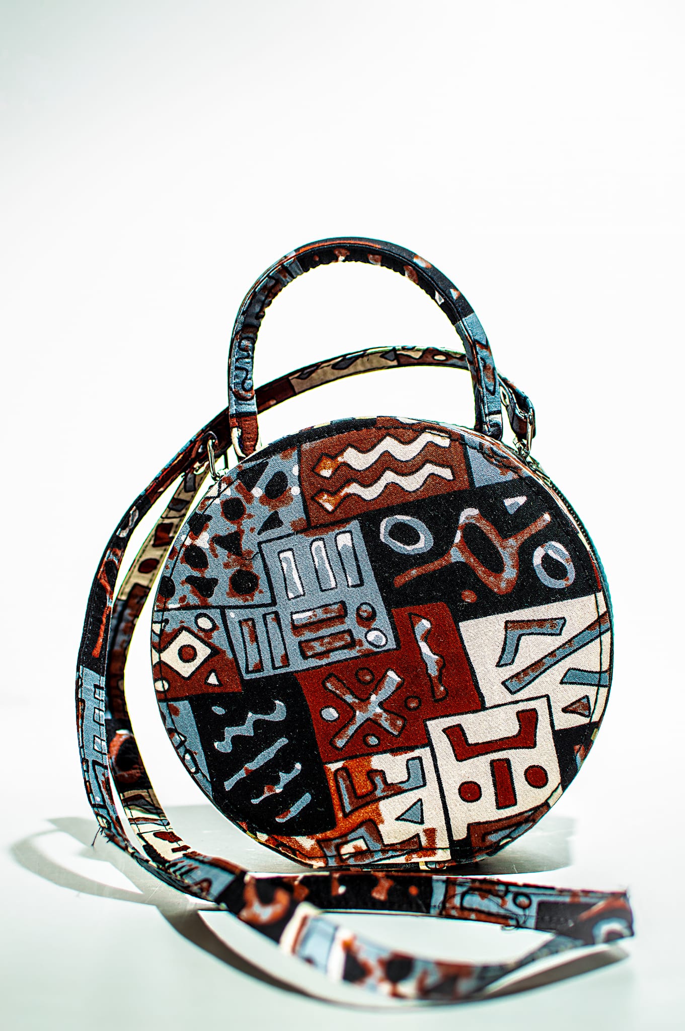 HANDMADE AFRICAN PRINT CIRCLE BAG BLUE, COFFEE, MAROON, BLACK AND WHITE BAG