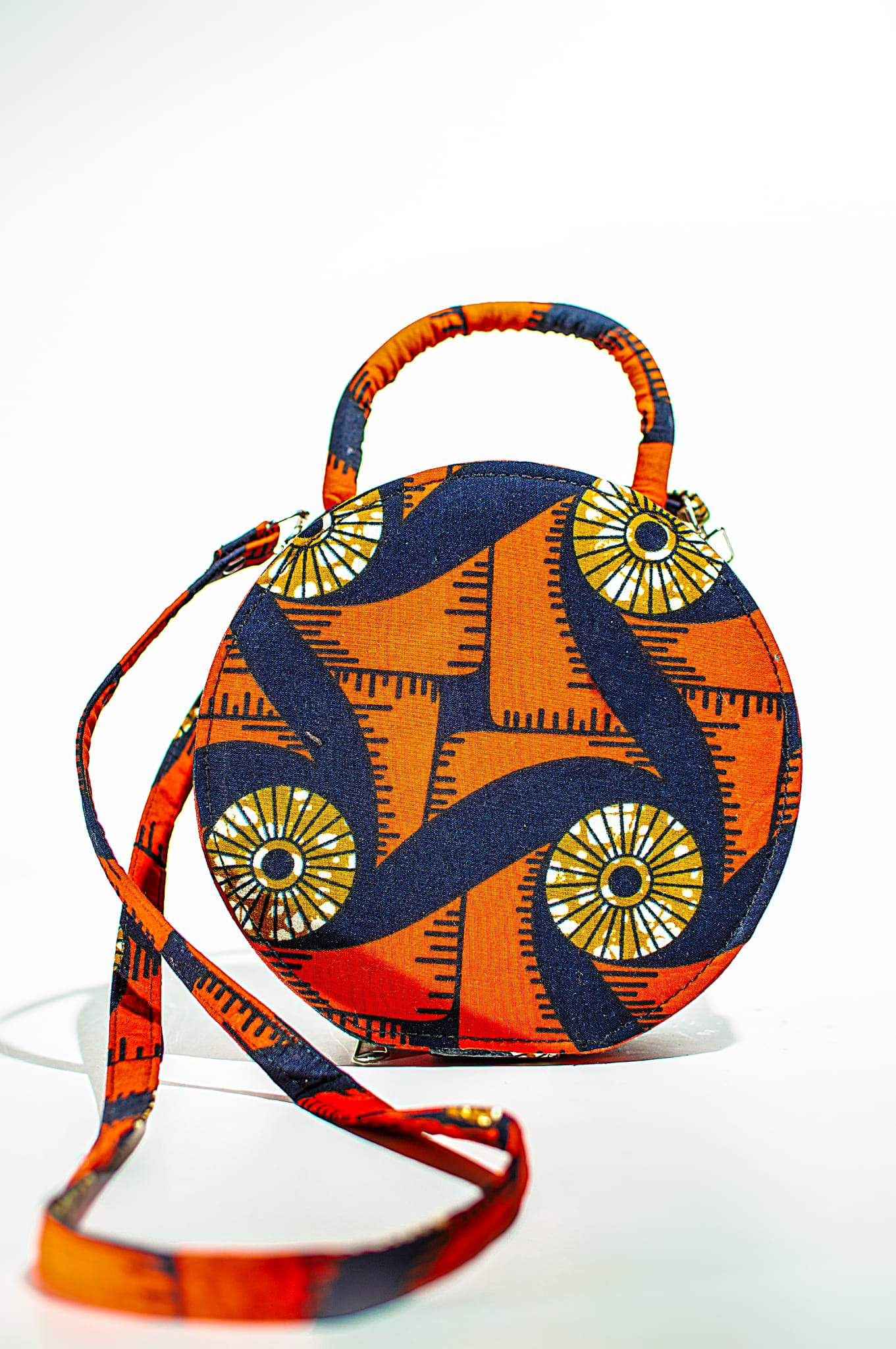 HANDMADE AFRICAN PRINT CIRCLE BAG ORANGE, DARK BLUE, GOLD & WHITE