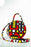 HANDMADE AFRICAN PRINT CIRCLE BAG RED, YELLOW, BLACK AND WHITE BAG